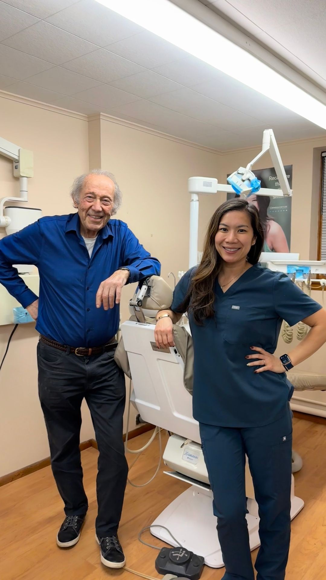 Dr. Sabin, person in gray long sleeve shirt holding black tablet computer, Millburn Dental, Herbert Sabin, 119 Millburn Ave.